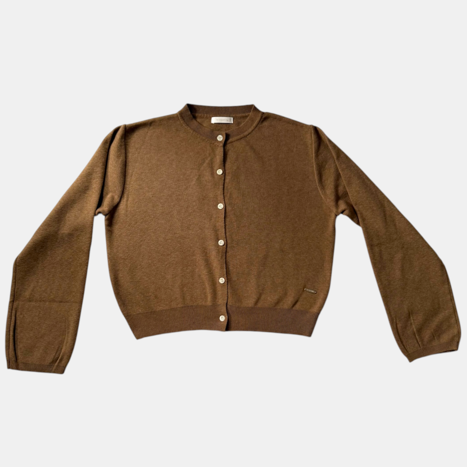 Brown cardigan on a white background
