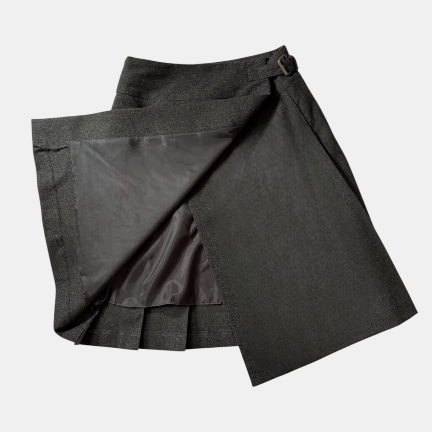 Dark grey pleated skirt on a light gray background