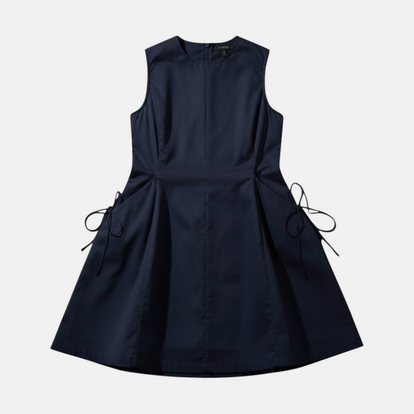 Navy blue sleeveless dress with bow details on a light gray background