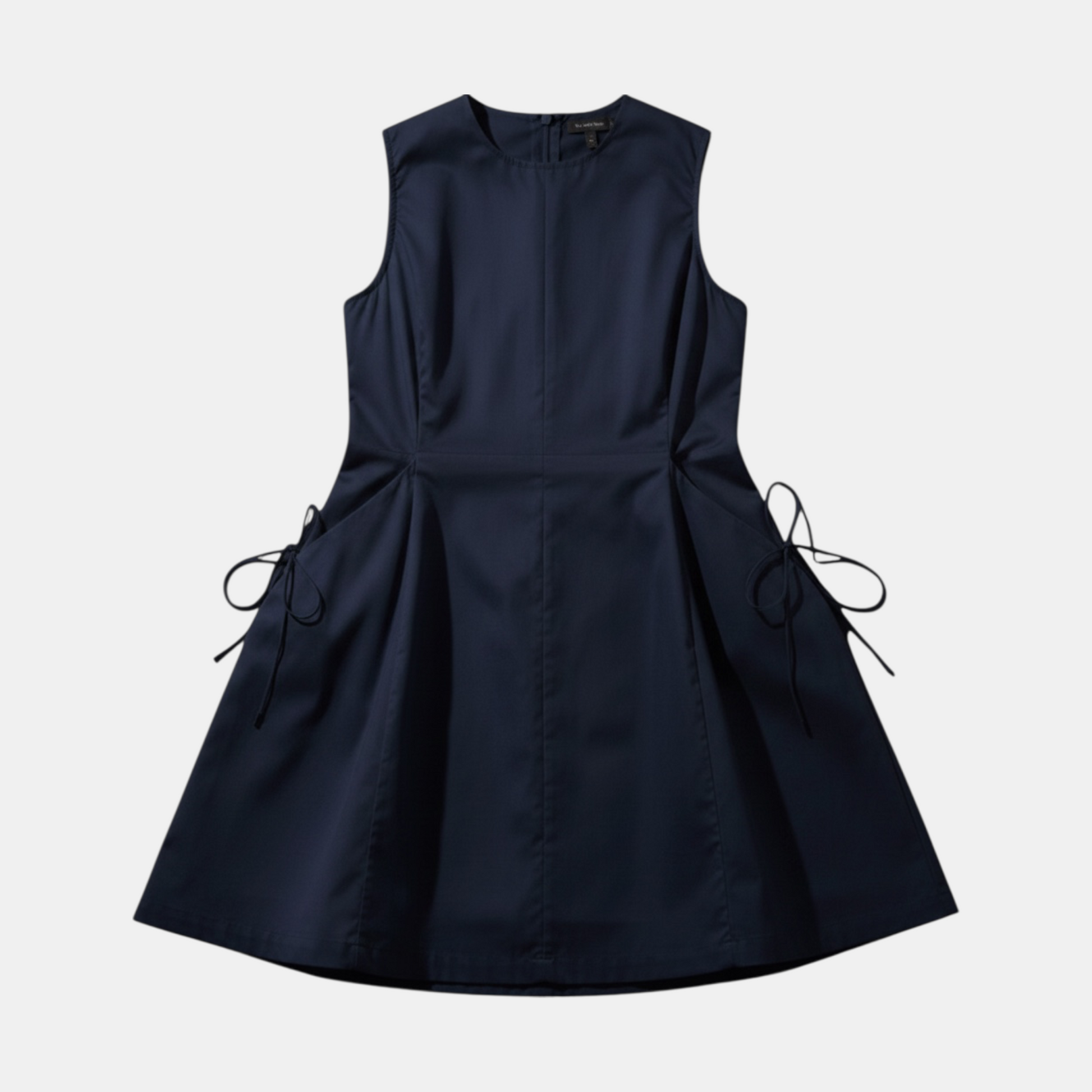Navy blue sleeveless dress with bow details on a light gray background