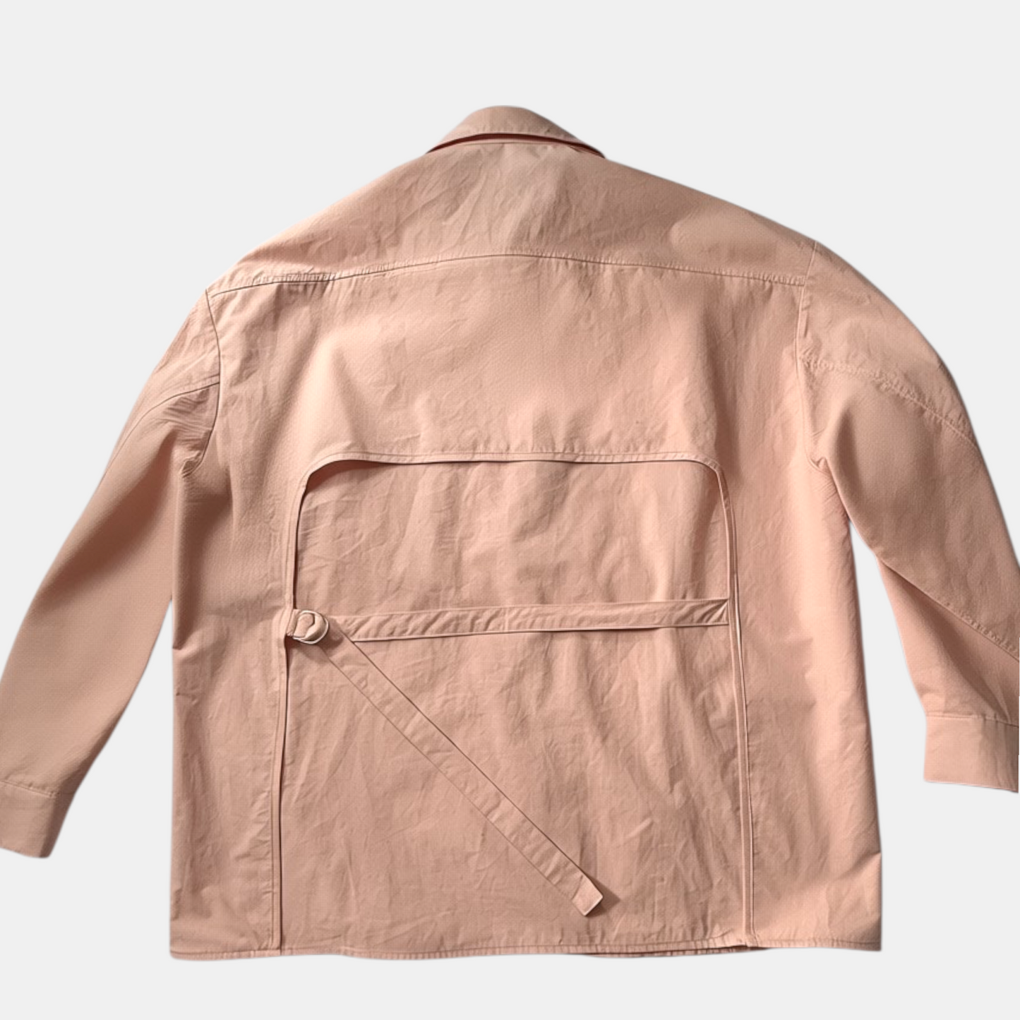 Pink jacket on a light gray background