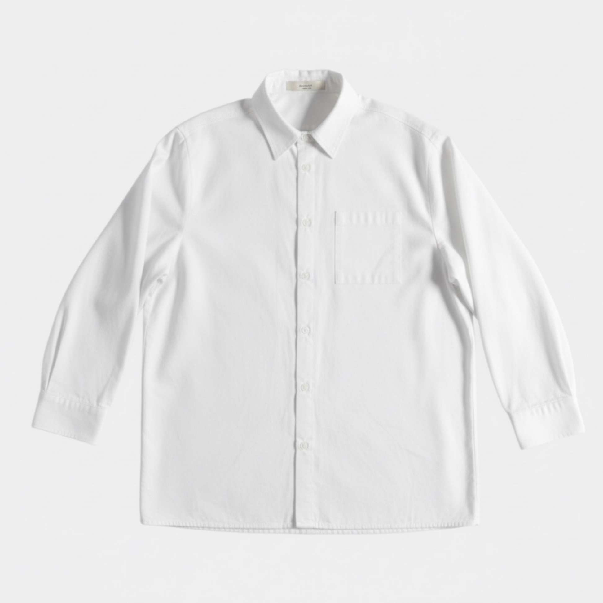 White shirt on a light gray background